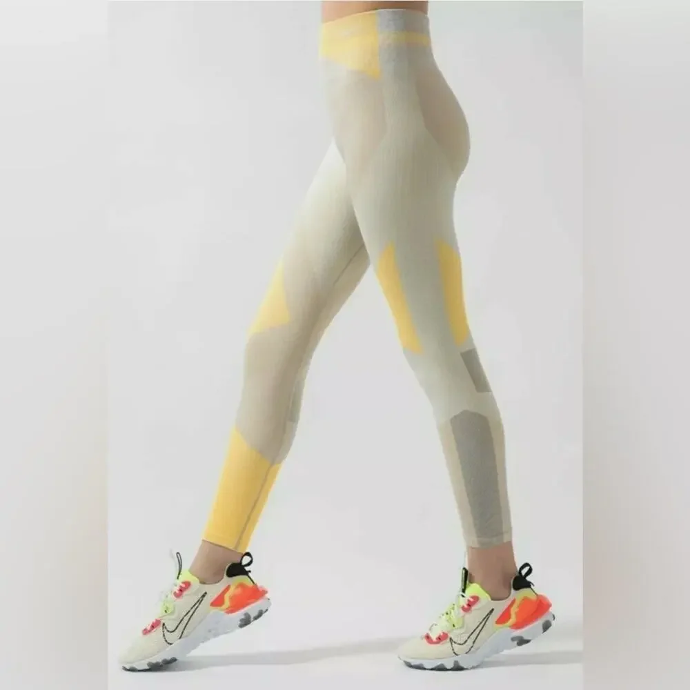 NIKE Sculpt LUX ICON CLASH Seamless 7/8 Training Knit Leggings yellow colorblock